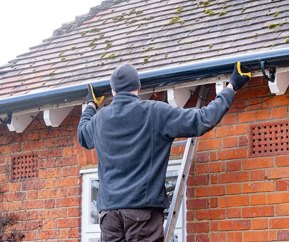 All Custom Roofing carrying out a roof maintenance service
